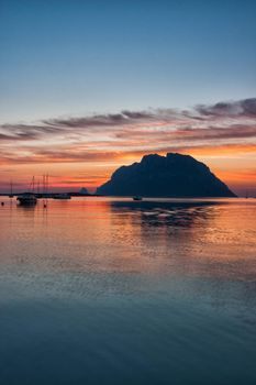 Famous Tavolara island at sunset on the Sardinia in Italy