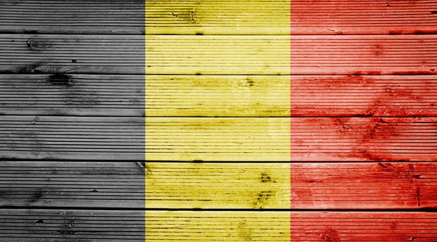 Natural wood planks texture background with the colors of the flag of Belgium