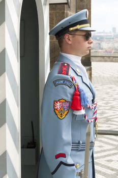 PRAGUE, CZECH REPUBLIC - JUNE 29: Guard on June 29, 2013 in Prague: Guard stands in front of entrance to Prague Castle, seat of president of Czech Republic
