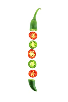 red and green hot chili pepper slices on a white background with a clipping path