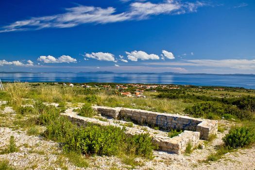 Island of Vir church on the hill ruins, with Adriatic sea landscape view