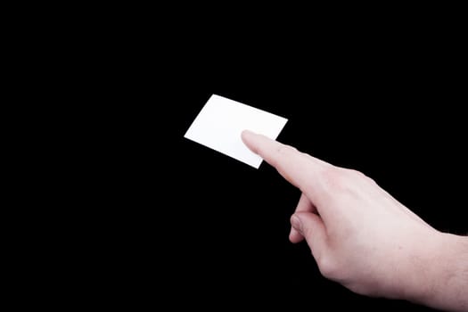 Man hand holding a blank business card.