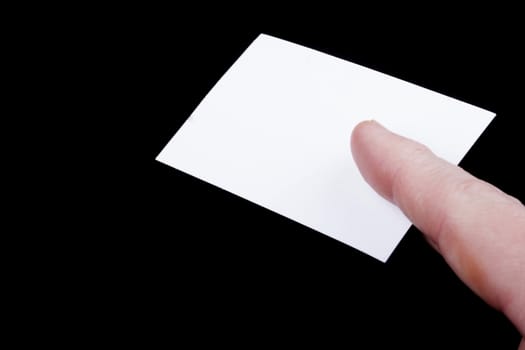 Man hand holding a blank business card.