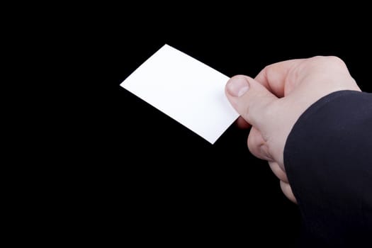 Man hand holding a blank business card.