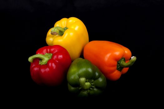 Multi-Colors peppers isolated on a black background