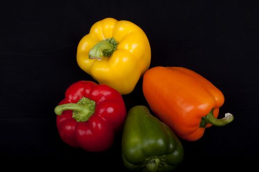 Multi-Colors peppers isolated on a black background