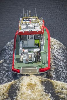 Rescue boat RS 142, Horn Flyer escorts MS Sj��kurs with NRK through Ringdalsfjord, heading for the port of Halden. Photo is shot from Svinesund bridge, Halden, Norway.