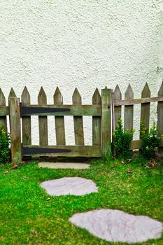 Picket fence and gate in a cottage garden