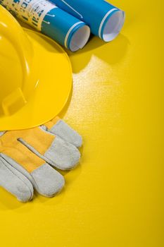 vertical copyspace image of working tools on yellow table