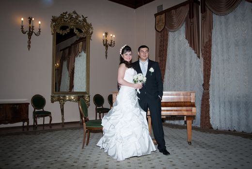 bride and groom in the living room