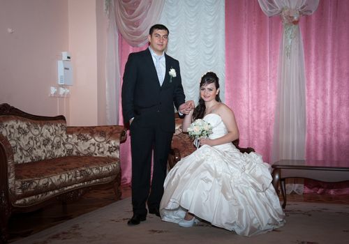 bride and groom in the living room