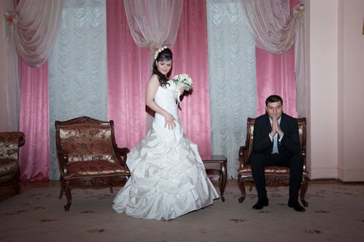 bride and groom in the living room