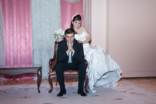 bride and groom in the living room
