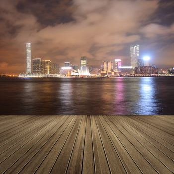 Cityscape of Victoria harbor in the night in Hong Kong, Asia.