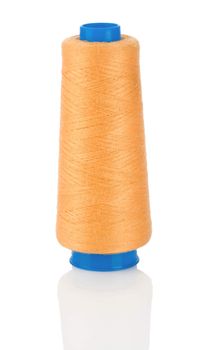 orange thread on blue Spool