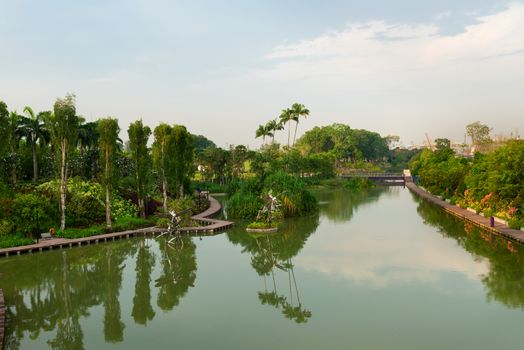 The artificial Dragonfly lake and walking pathes in park at Gardens by the Bay, Singapore. 