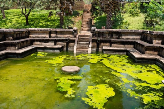 Ruins of  Kumara Pokuna (royal bathing pond) in ancient Sri Lanka capital Polonnaruwa