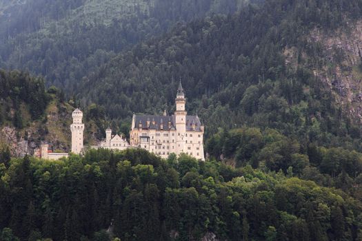 Neuschwanstein Castle is a 19th-century Romanesque Revival palace on a rugged hill above the village of Hohenschwangau near Füssen in southwest Bavaria, Germany. The palace was commissioned by Ludwig II of Bavaria as a retreat and as an homage to Richard Wagner.