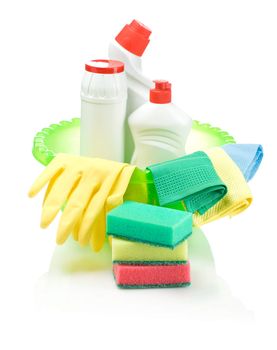 supplies for cleaning in green basin