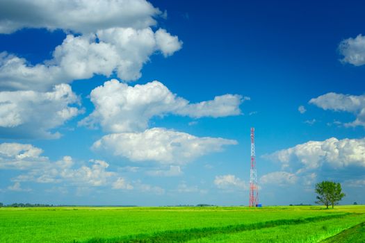 Tower of mobile communication on a field