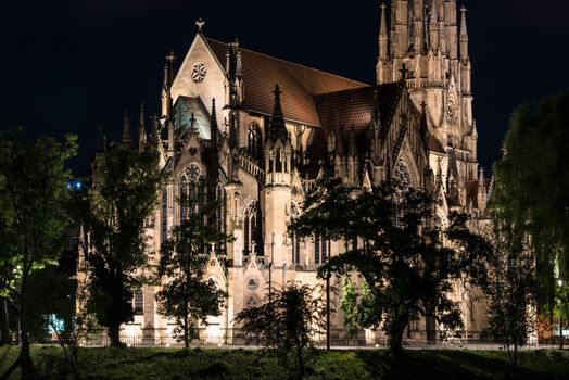 Beautiful Johanneskirche protestant church over Feuersee (Fire lake) in Stuttgart, Germany at night