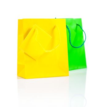 yellow and green paper bag isolated