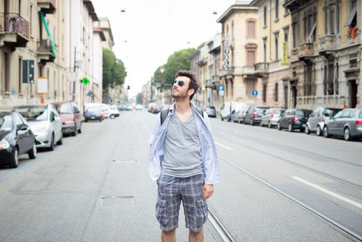 man walking in the street in the morning