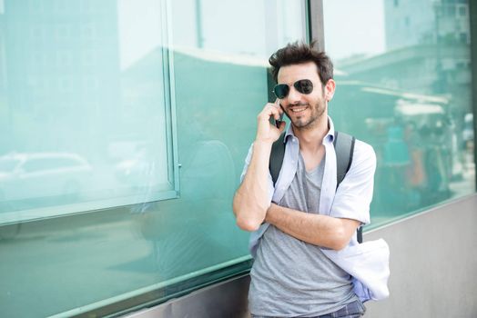 man in the street on the phone in the morning