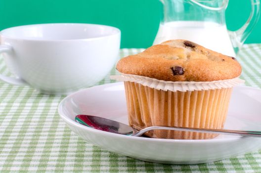 Fresh muffins on the table.