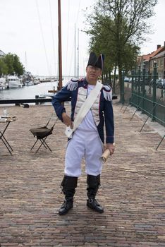 HELLEVOETSLUIS,HOLLAND - JUNE 29:Unidentified man in france uniform on the arts day,on June 29,2013 in Hellevoetsluis,Holland.This days is once a year to introduce art and culture