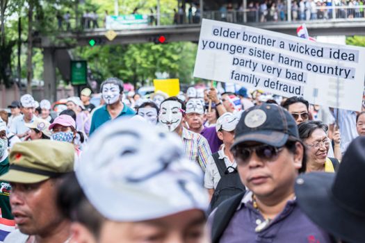BANGKOK,THAILAND- JUNE 30 : Unidentified protesters, V for Thailand group, wear Guy Fawkes masks to protest government corruption on June 30,2013 in Bangkok,Thailand.