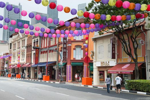 SINGAPORE - SEP 08: Chinatown street is decorated with colourful paper lanterns for Mid-Autumn festival on Sep 08, 2013 in Singapore. It is a traditional Chinese harvest celebration.