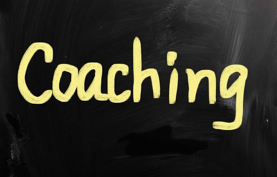 business ideas handwritten with white chalk on a blackboard.