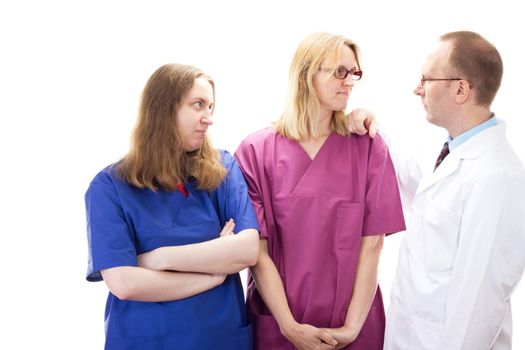 Male medical physician taking nurse to task