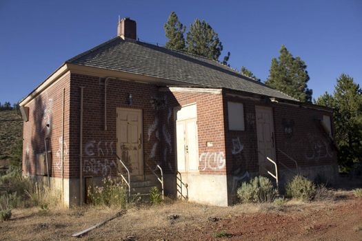 an old brick house in the forest or countryside