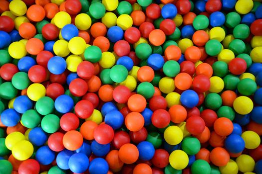 colored balls in play center for children
