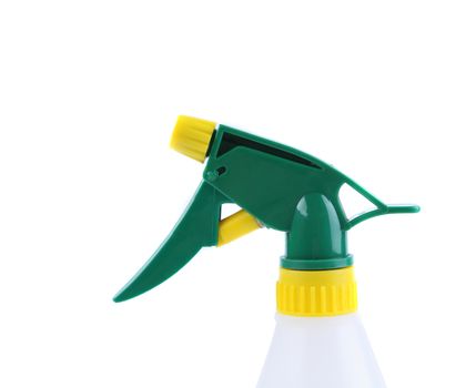 Spray from a bottle of cleaner on the white background