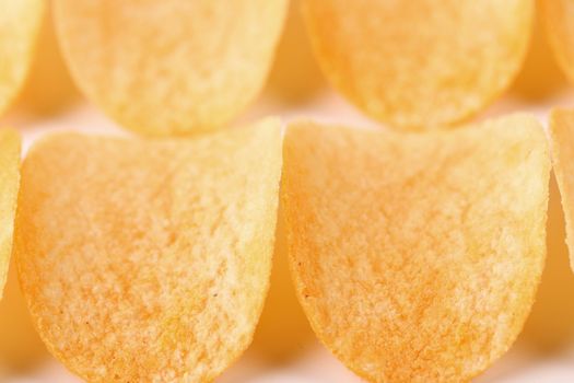 Close-up potato chips as a background