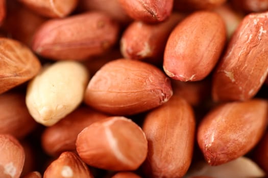 Extreme close-up image of peanuts, a brown background image