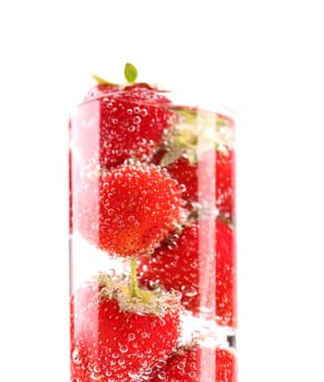 Glass with strawberries isolated on the white background