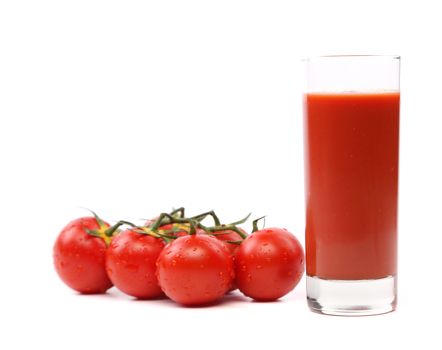 Cluster of Tomatoes and a glass of juice on the white background