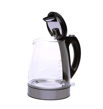 Glass modern kettle isolated with on white