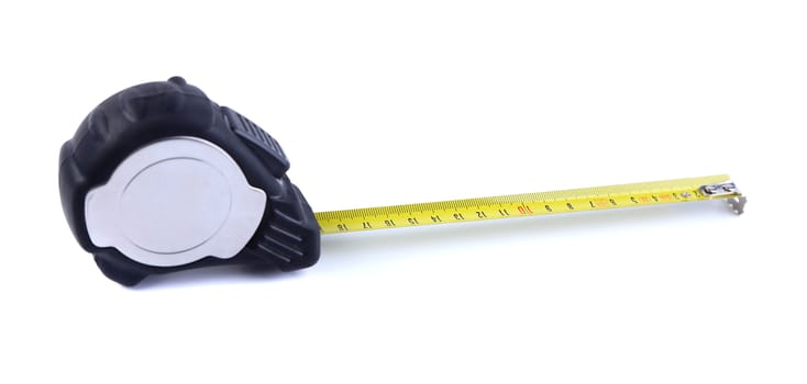 Tape measure isolatedis located left on the white background