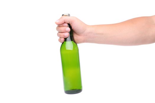 Beer bottle in the hand isolated on white