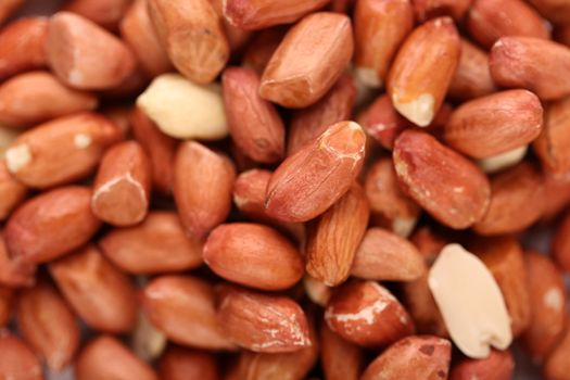 a pile of peanuts on white background