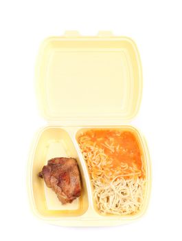 chicken with rice in food container on a white bacground