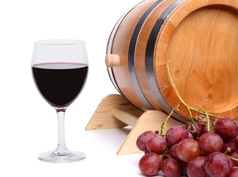 Red wine, grapes and old barrel on white background