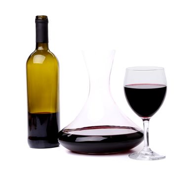 glass and bottle of red wine decanter