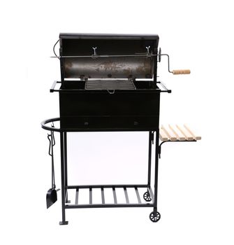 A picture of a new black barbecue with a cover over white background