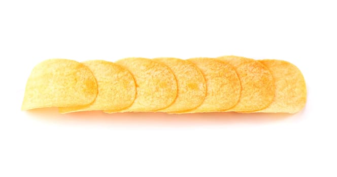 Row of potato chips on a white background